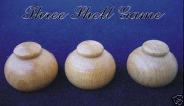 Nussschalenspiel (Nußschalenspiel, Nussschalen-Spiel)  - Shell Game -